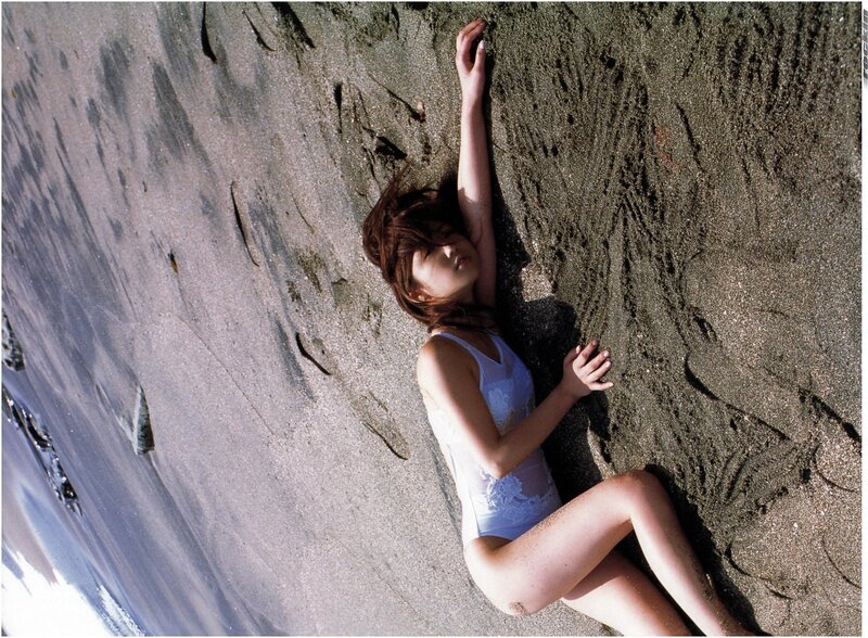 woman in swimsuit on beach