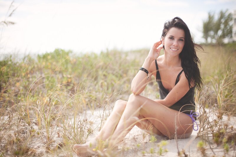Woman in swimsuit on beach