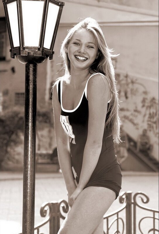 woman in swimsuit smiling