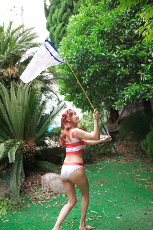 Woman in swimsuit with net