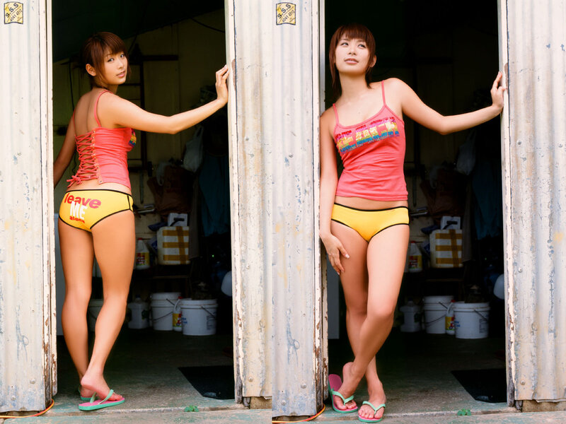 Woman in swimwear at doorway