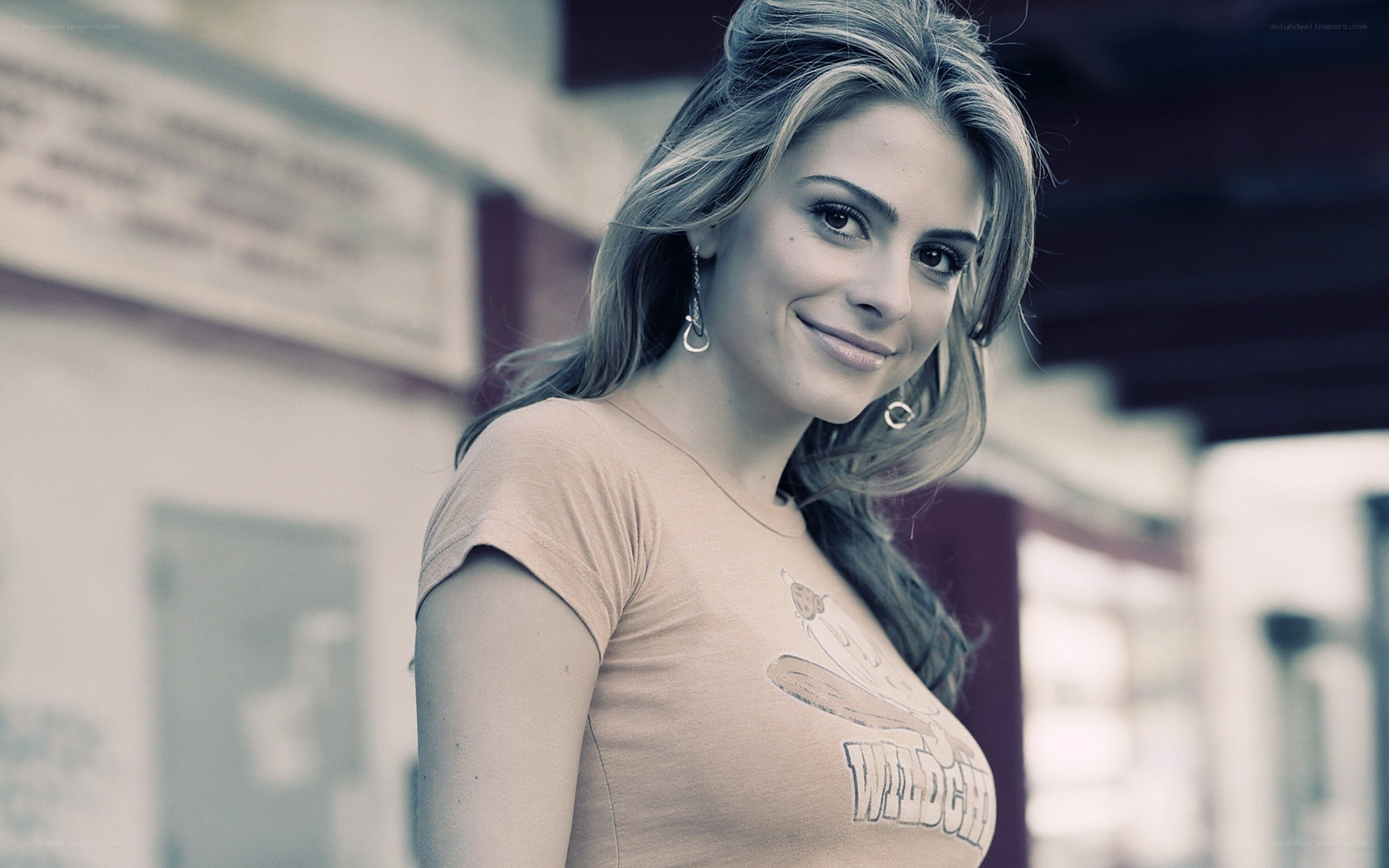 woman in t-shirt smiling