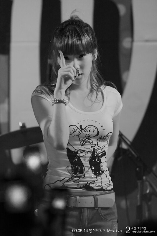 woman in t-shirt with cartoon graphic