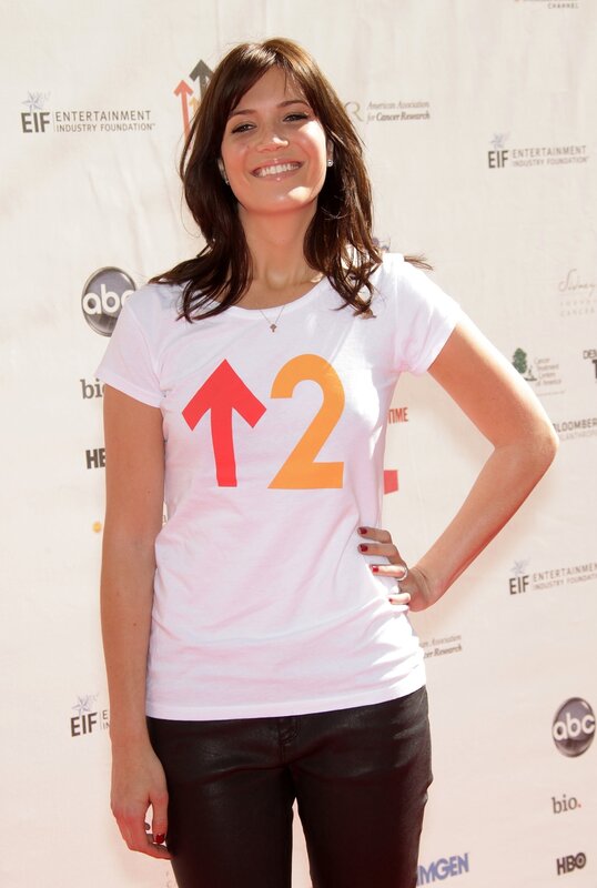 woman in t-shirt with up arrow