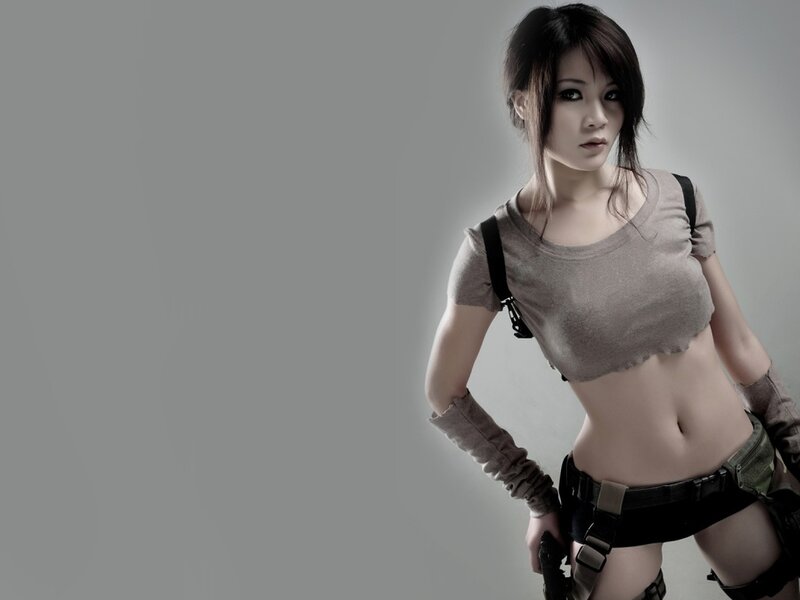 Woman in Tactical Gear — Gray, Serious