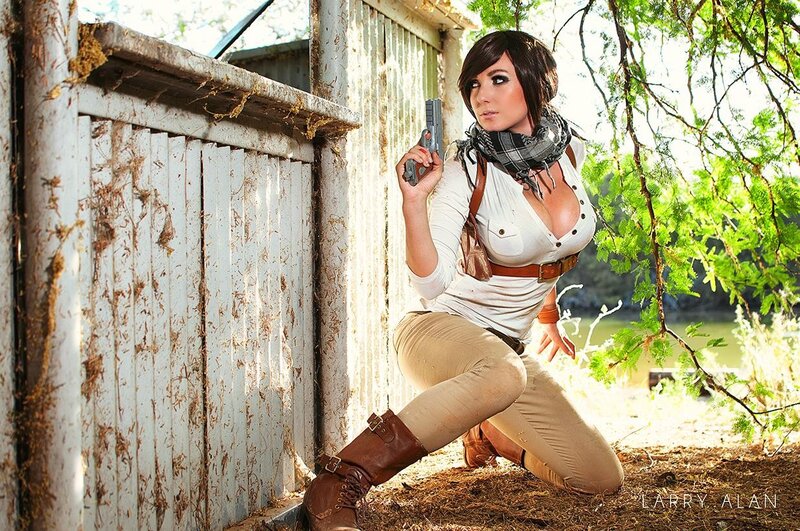woman in tactical pose with gun