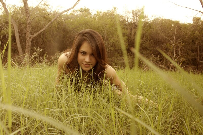 woman in tall grass