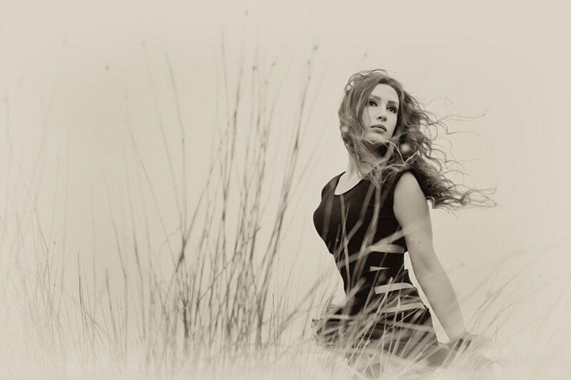 Woman in Tall Grass — Black, Dramatic