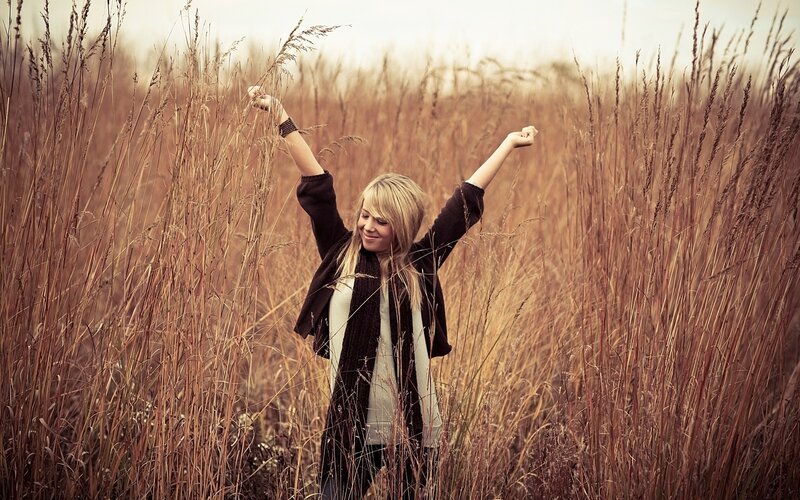 Woman in Tall Grass — Brown, Peaceful
