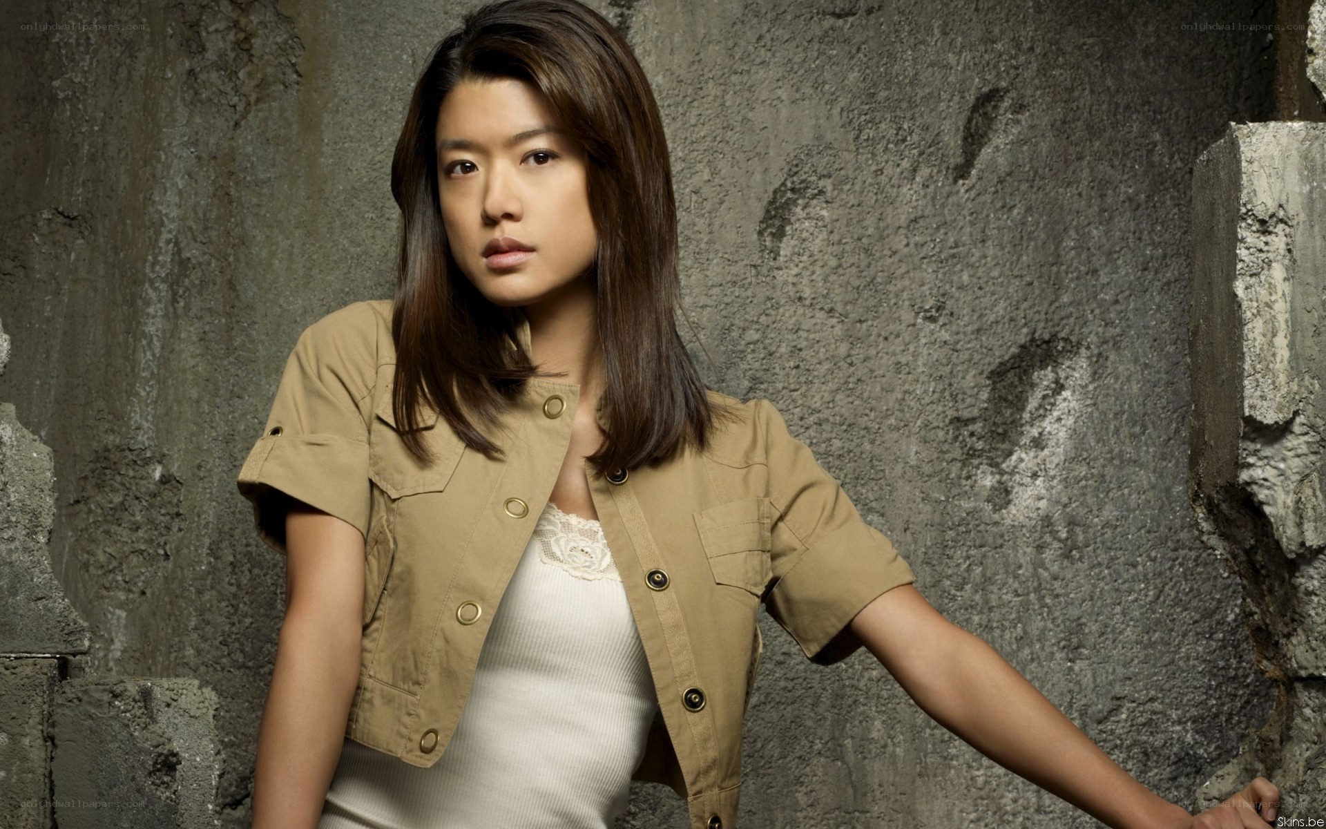 woman in tan jacket