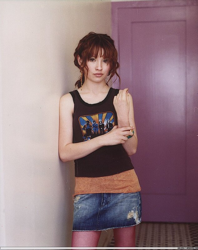 woman in tank top and denim skirt