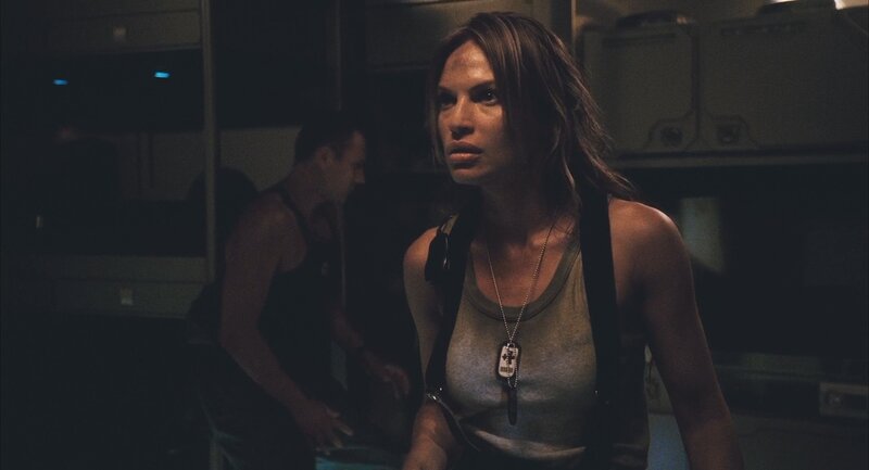 Woman in Tank Top — Gray, Tense