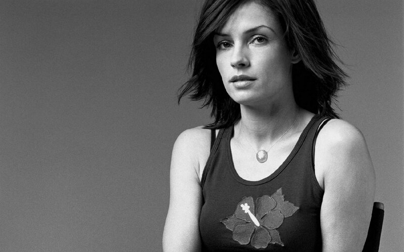 woman in tank top with flower