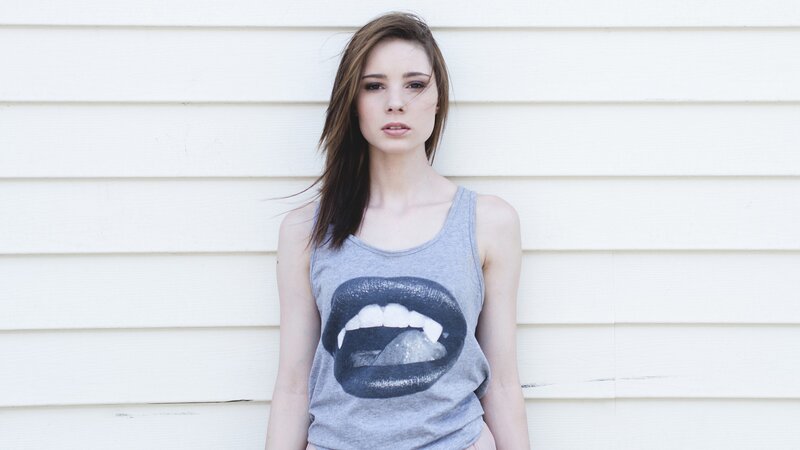woman in tank top with lips graphic