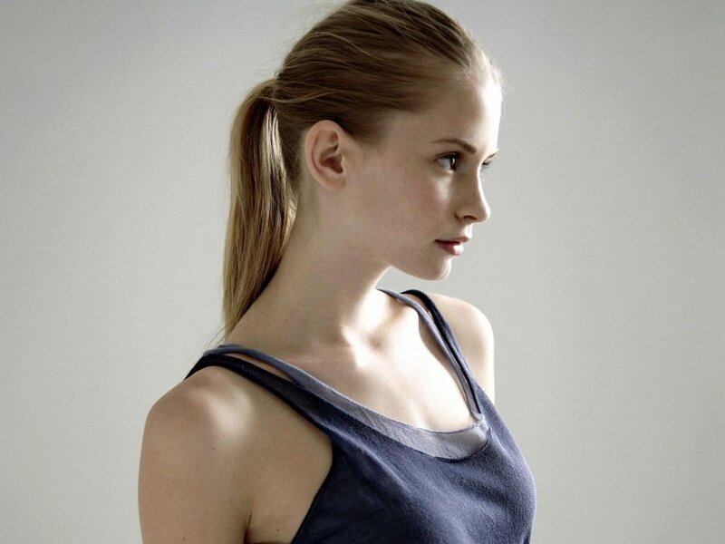 woman in tank top with ponytail