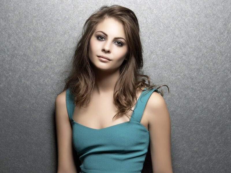 woman in teal dress