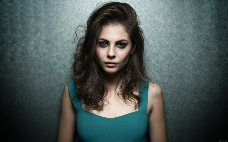 woman in teal dress