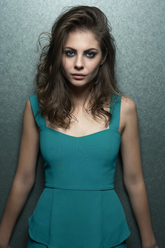 woman in teal dress