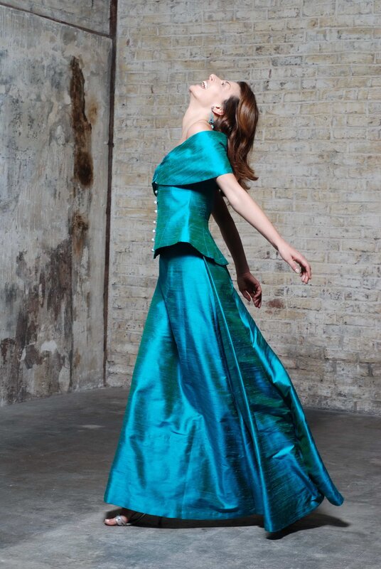 Woman in teal gown