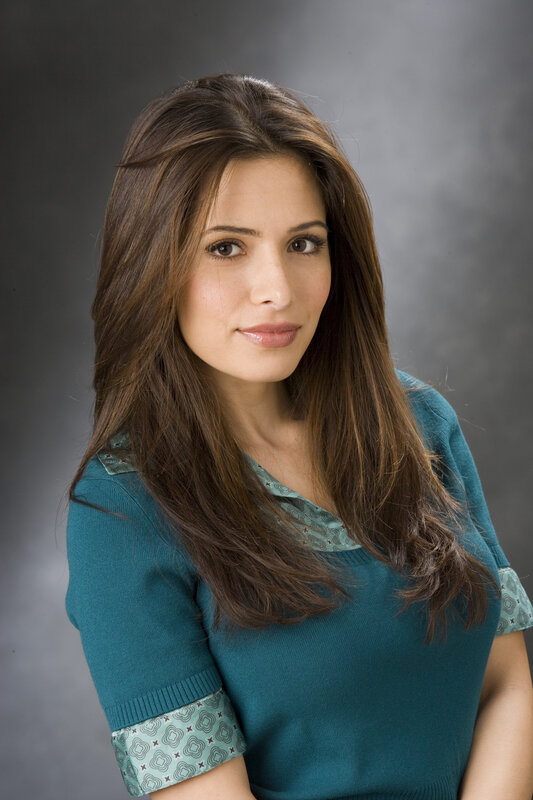 woman in teal sweater