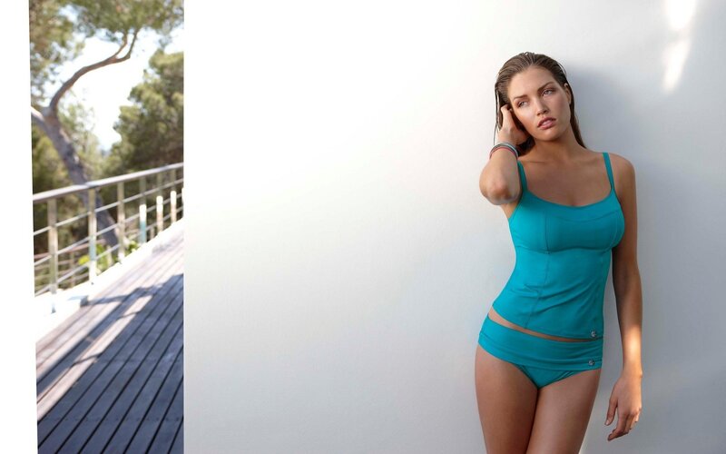 woman in teal swimsuit