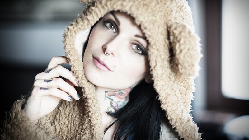 woman in teddy bear hat