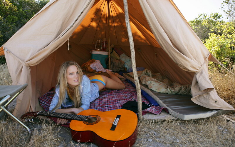 Woman in Tent with Guitar