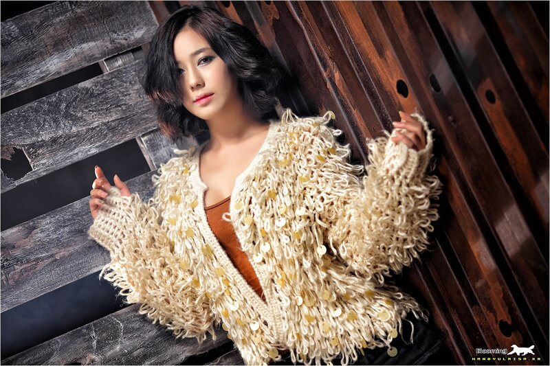 woman in textured cardigan