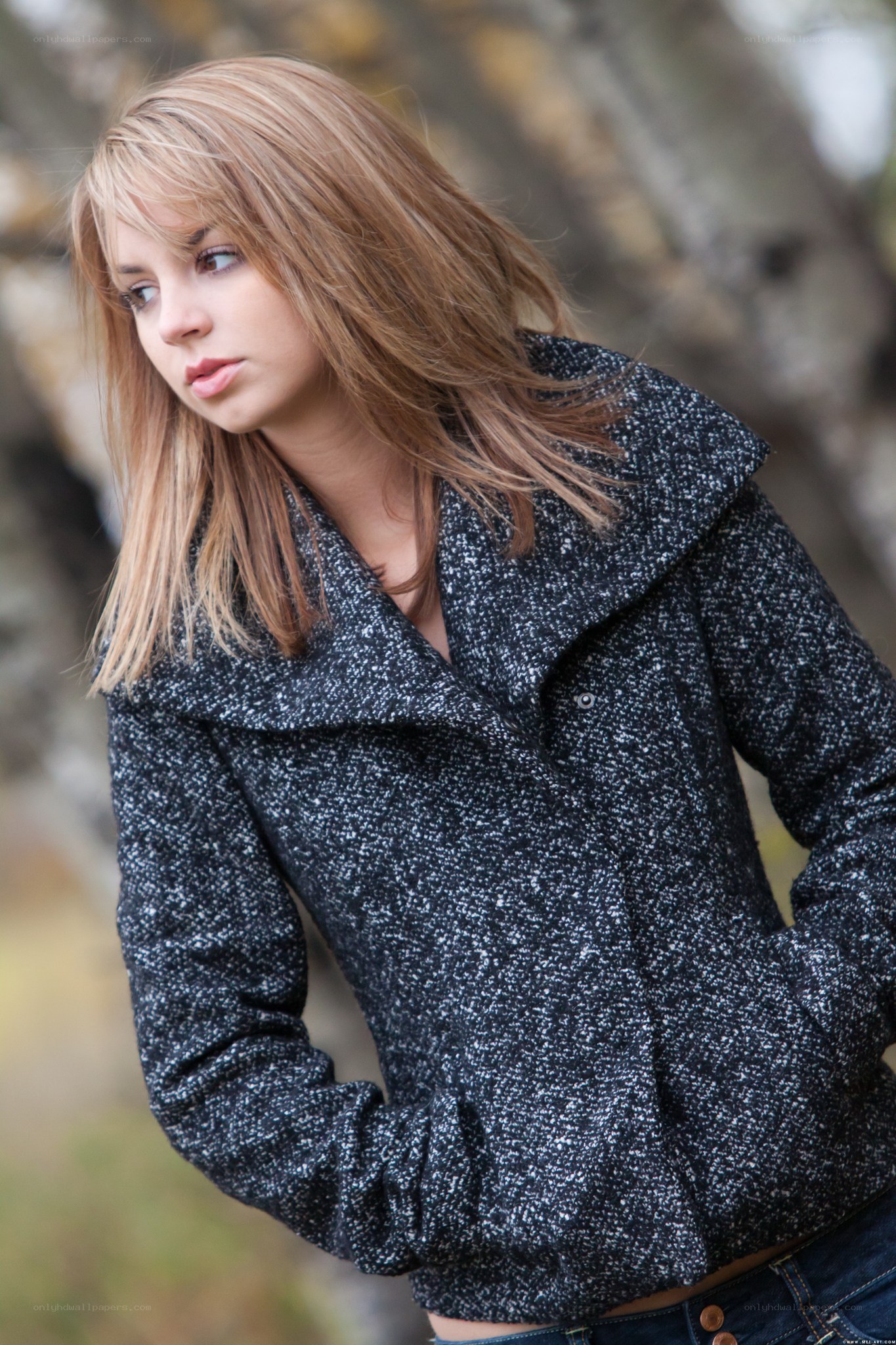 woman in textured jacket