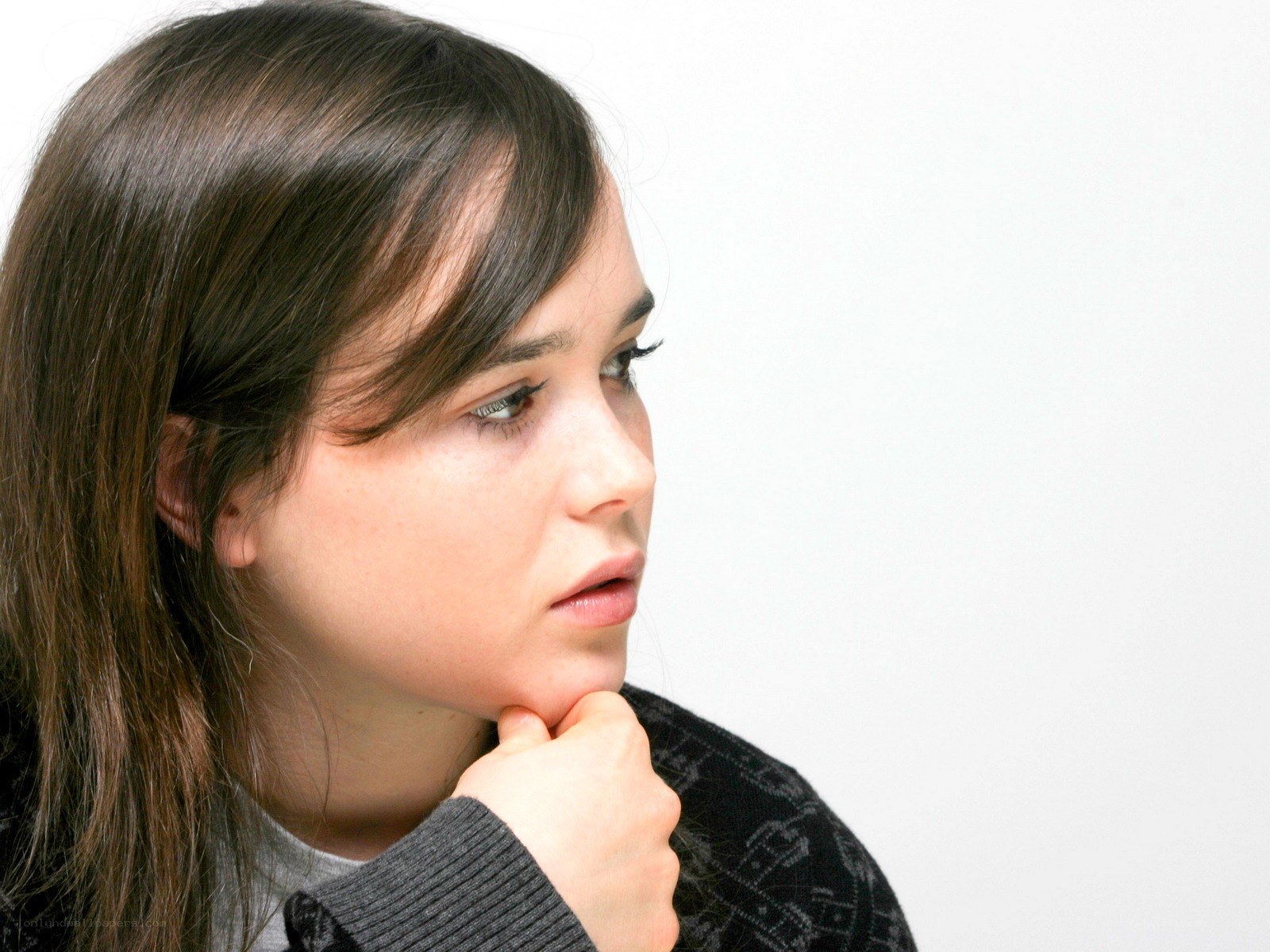 woman in thoughtful pose