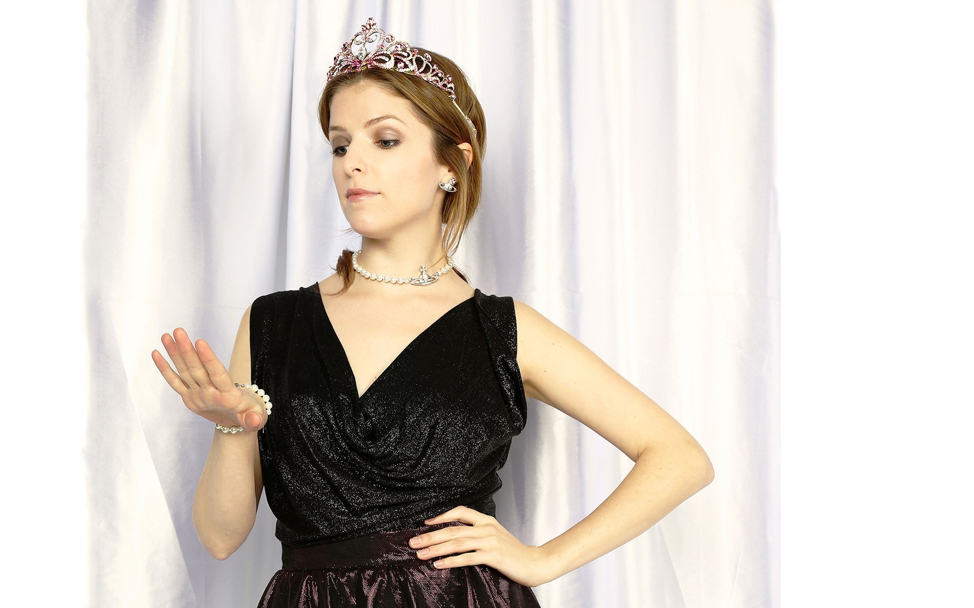 woman in tiara and black dress