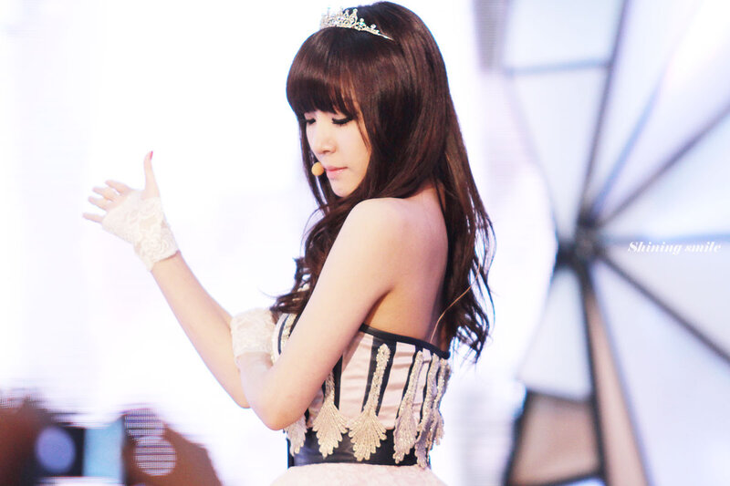 woman in tiara on stage