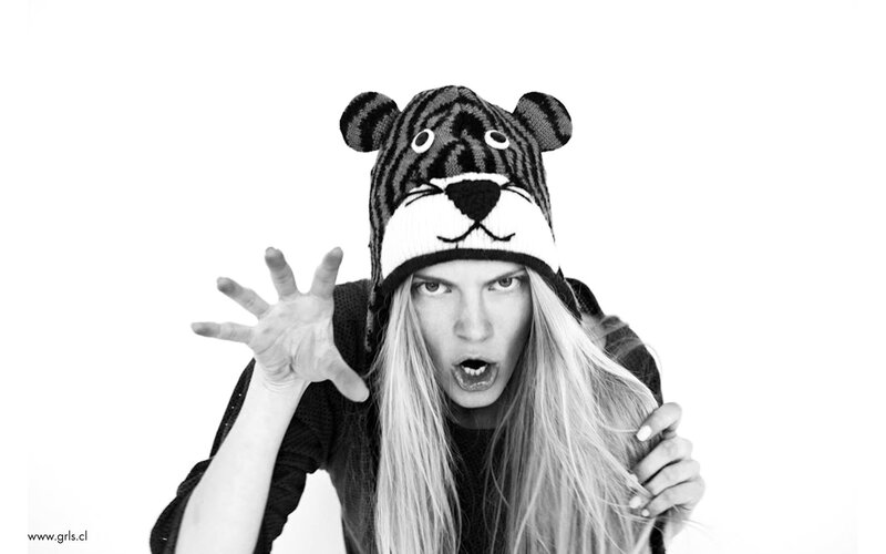 woman in tiger hat making face