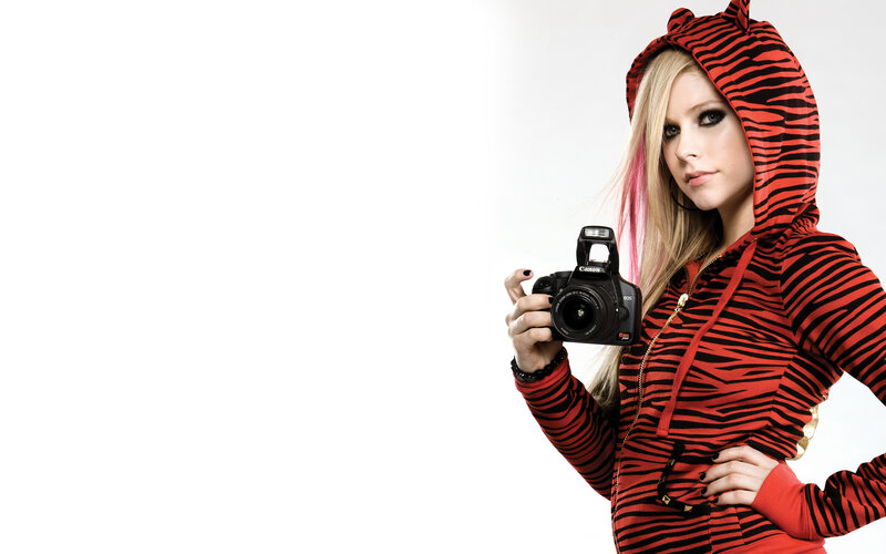 woman in tiger hoodie with camera