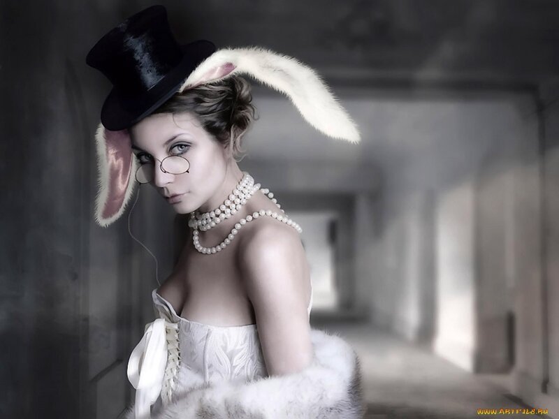 woman in top hat and bunny ears