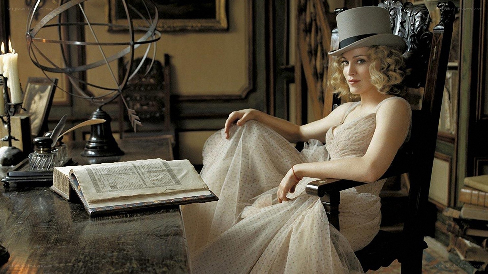 woman in top hat and dress