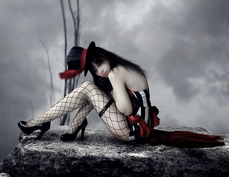 Woman in Top Hat Sitting
