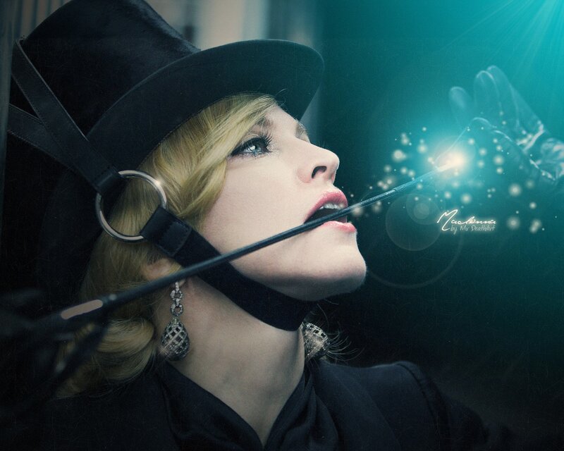 woman in top hat with magic wand