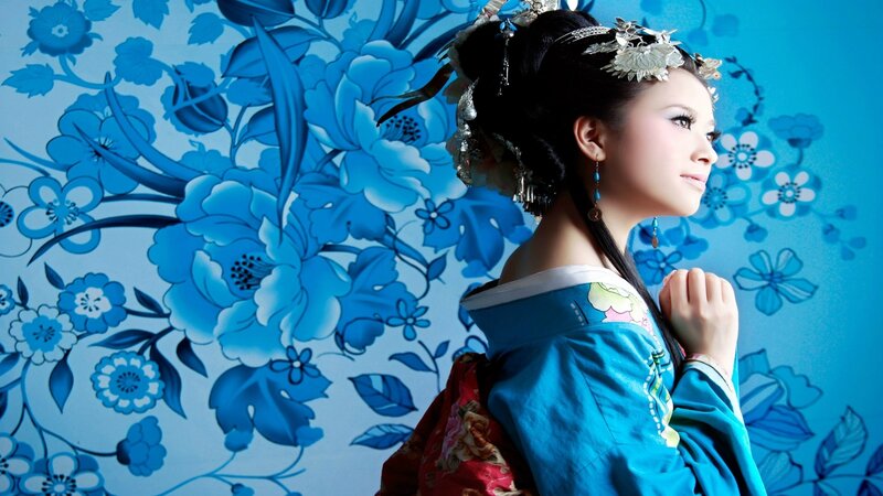 Woman in Traditional Attire — Blue, Serene, Photograph