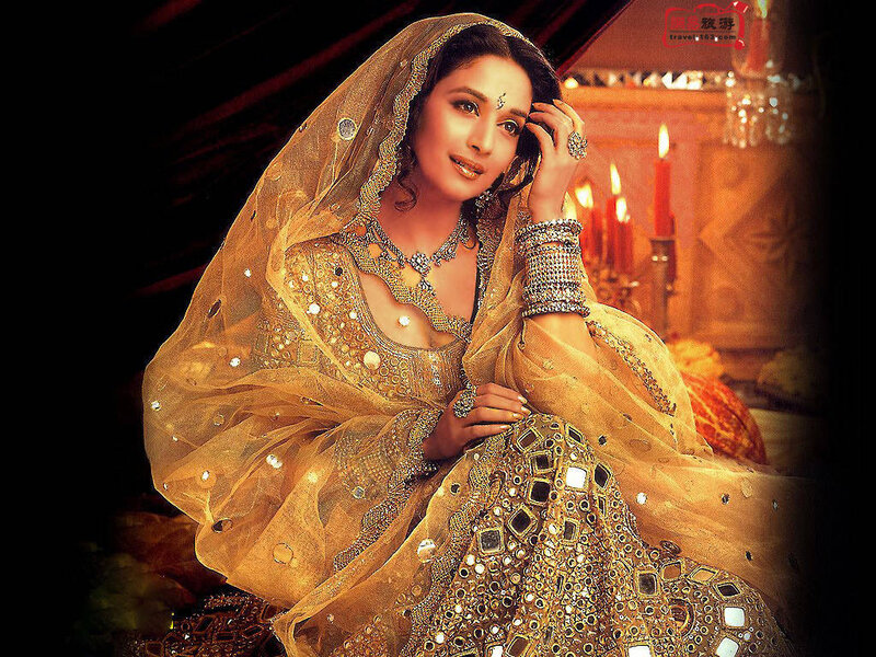 Woman in Traditional Attire — Gold, Dramatic, Night, Photograph