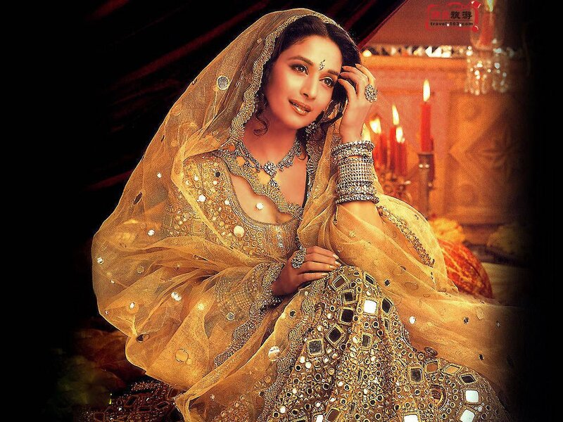 Woman in Traditional Attire — Gold, Dramatic, Night