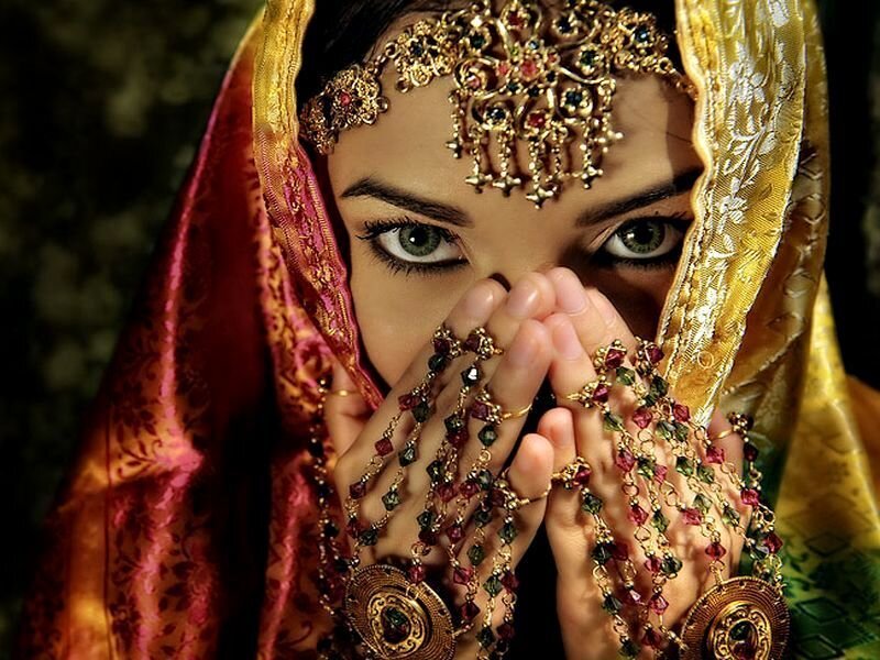 Woman in Traditional Attire — Gold, Dramatic, Photograph
