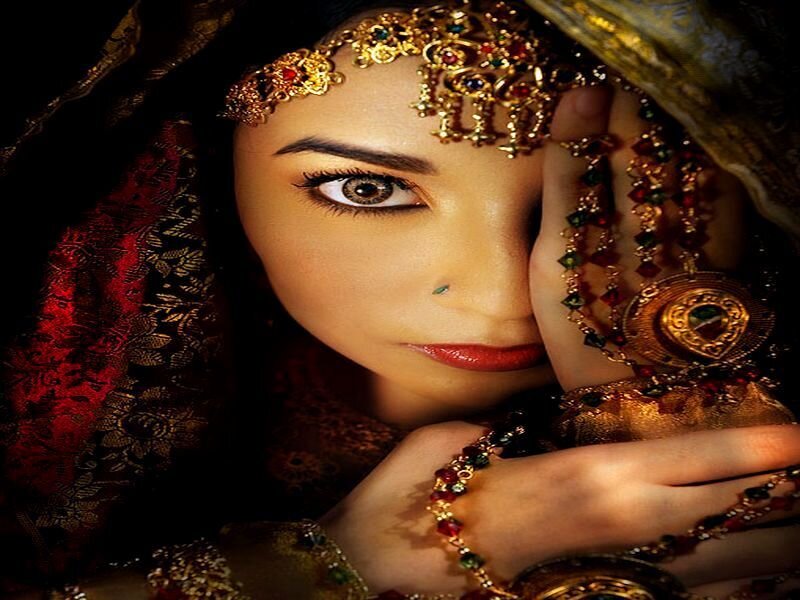 Woman in Traditional Attire — Gold, Dramatic