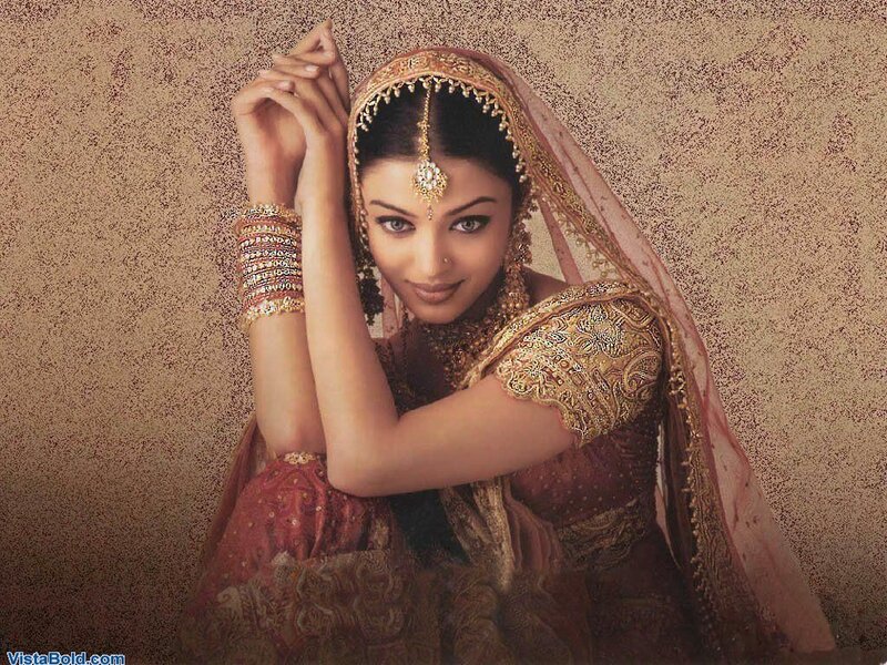 Woman in Traditional Attire — Gold, Serene, Photograph