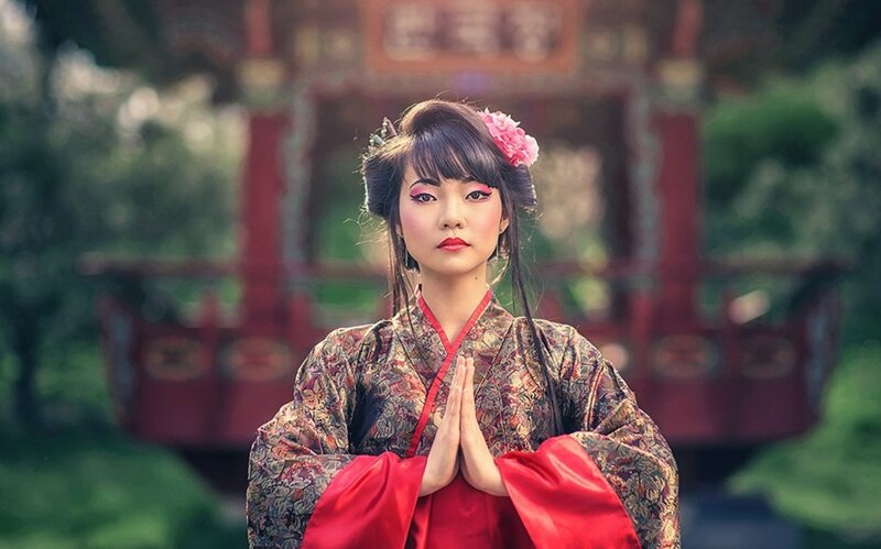 Woman in Traditional Attire — Red, Serene, Photograph