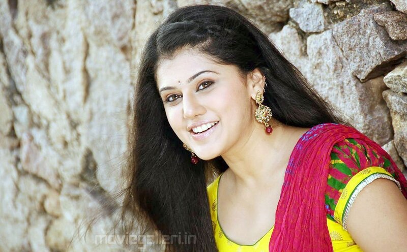 woman in traditional attire smiling