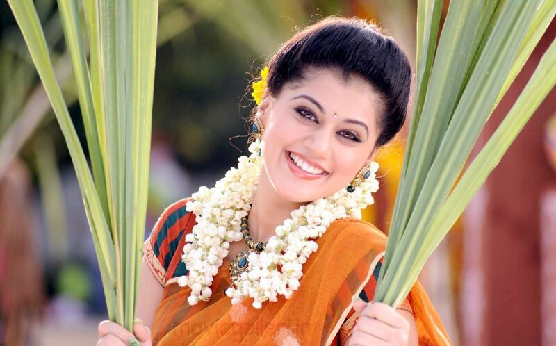 woman in traditional attire smiling