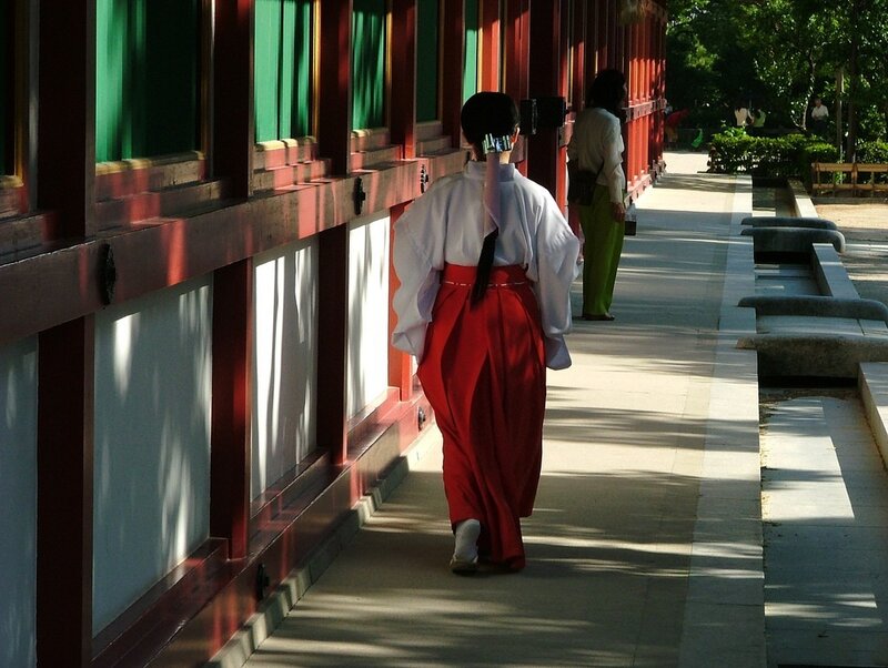Woman in traditional attire walking