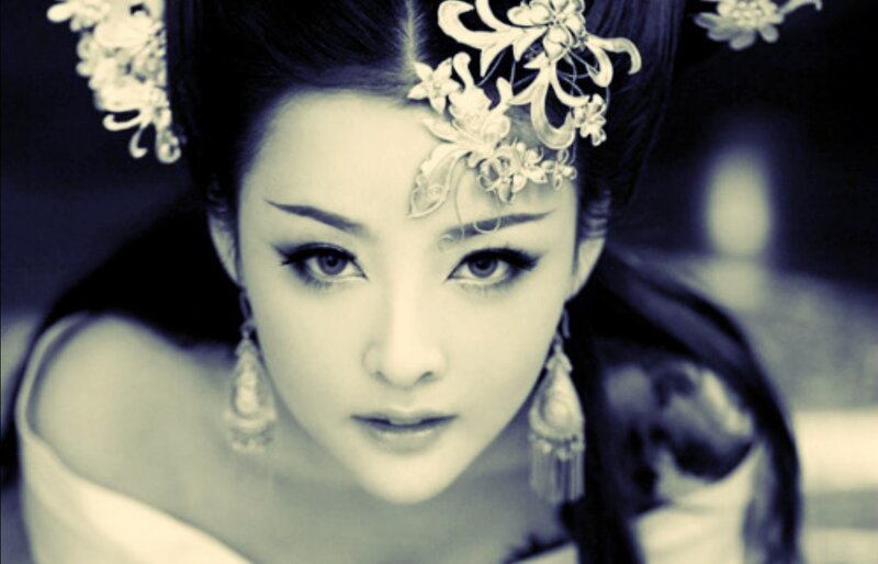 Woman in Traditional Costume — Black, Dramatic, Photograph, Hair Ornament