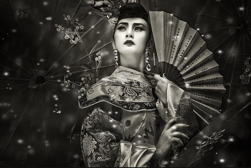 Woman in Traditional Costume — Black, Dramatic